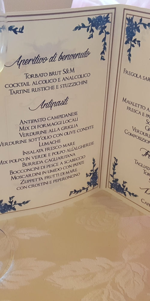 Realizzazione grafica e impaginazione di un menu A5 - da distribuire nei vari tavoli - per un matrimonio.